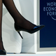 The shoes of Sandberg, Chief Operating Officer of Facebook are pictured during the annual meeting of the World Economic Forum (WEF) in Davos